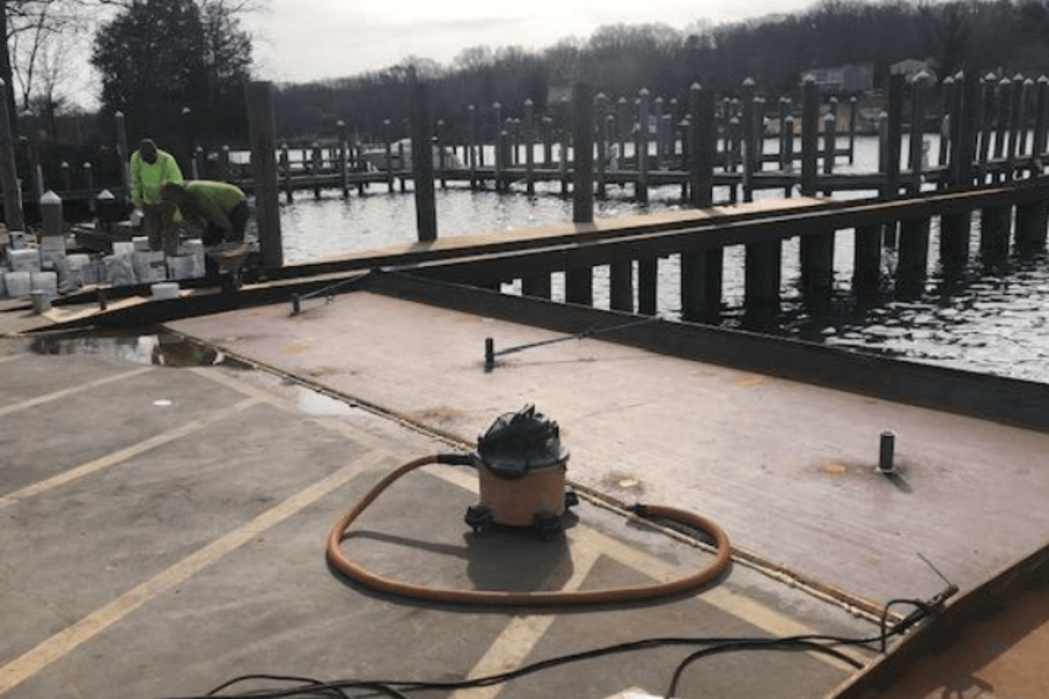 The ramp and bulkhead were sealed during construction and 2” diameter pipe nipples were welded where holes had been cut to provide access for the epoxy grout.